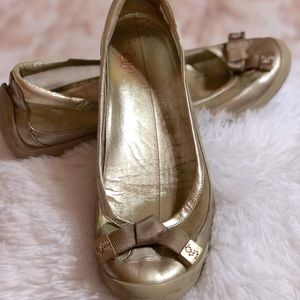 Gold G Series by Nike